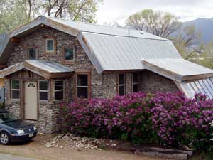 Slipform Stone Masonry barn style home.