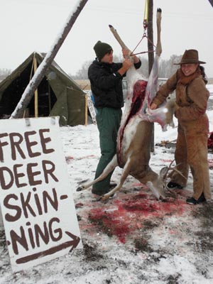 Students learn how to skin deer at Green University.