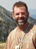 Tom Elpel, hiking in the Madison Range.